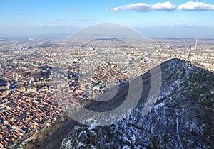 TÃ¢mpa mountain and Brasov City , winter aerial landscape