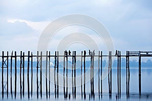 U-Bein teak bridge on Taungthaman lake in Amarapura, Mandalay d