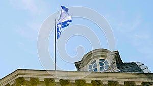 U European Union official symbol flag waving on rooftop