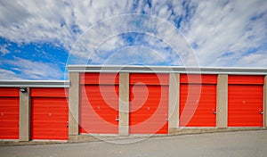 U-HAUL self storage location, garage with red closed shutters