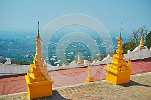 U Min Thonze stupas with a view on foggy green plain of Sagaing