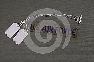 U.S. AIR FORCE Branch Tape with dog tags on olive green uniform