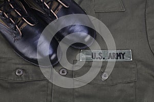 U.S. Army olive green uniform with boots photo
