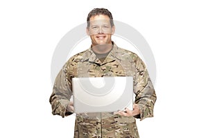 U.S. Army Soldier, Sergeant. Isolated with laptop.