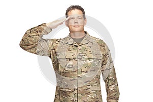 U.S. Army Soldier, Sergeant. Isolated and saluting.