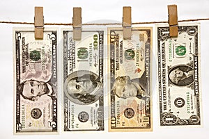 U.s. Currency Hanging On Clothesline