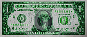 1 U.S. dollar with green glitter backgroundfor photo