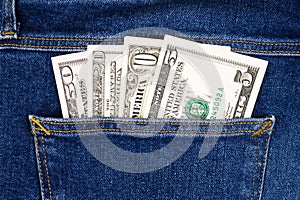 U.S. dollars in the back jeans pocket. Close up