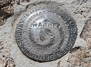 U.S. Geodetic surveying land marker at the top of Harney Peak in Custer State Park in the Black Hills of South Dakota USA