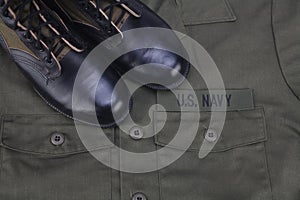 U.S. Navy olive green uniform with boots photo