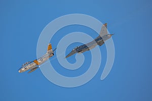 U.S. Navy`s Flight training with old and new aircraft next to each other in the air of San Diego