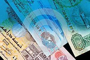 UAE dirham currency notes. Money background blue color toned