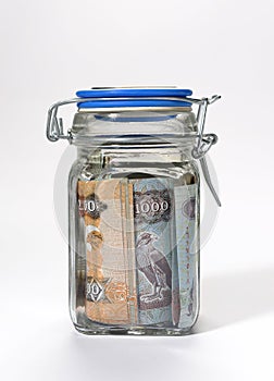 Uae dirhams in jar