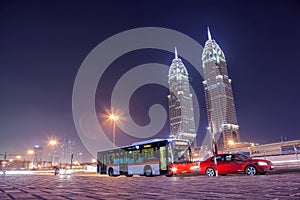 UAE/DUBAI - 26 SEP 2012 - Bus stop with twin towers in background. City of Dubai, Internet city.