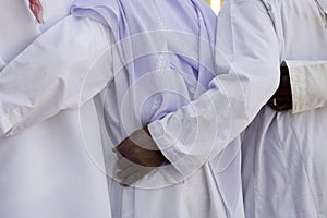 UAE Dubai group of traditionally dressed Muslim men perform a song for visitors to the Bastakia photo