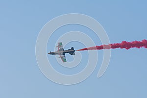 UAE Largest Military Union Fortress 7 Show in Umm al Quwain with coordinated military aircrafts showing the UAE flag colors on the photo