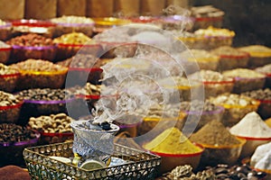 UAE spices and fragrance street market with aromatic smoker