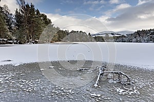 Uath Lochan in Winter at Glen Feshie in the Cairngorms National Park.
