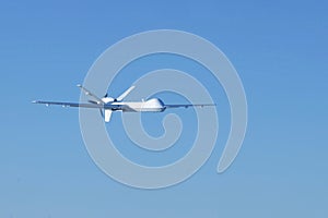 UAV in a cloudless sky. Elements of this image furnished by NASA