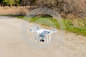 Uav drone copter flying with digital camera. Hexacopter drone with high resolution digital camera on the sky. photo