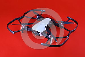 Uav drone copter isolated on red background