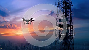UAV drone flying near 5G cellular antenna during dramatic sunset, communication network. Telecommunication, smart city