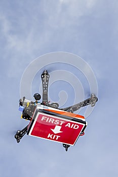 UAV drone quadrocopter transporting First aid kit box