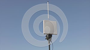 UAV ground antenna. Drone aerial wire. Rotating UAV antenna. Antenna against the blue sky