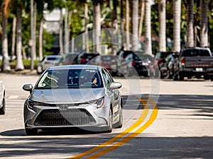 Uber car in motion on the streets of Miami