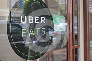 Uber Eats Sign on a restaurant door