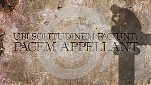 Ubi solitudinem faciunt, pacem appellant. Latin phrase. photo