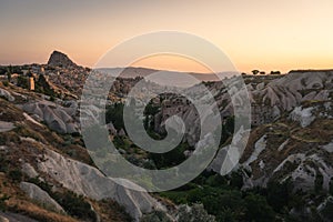 Uchisar castle, highest point in Cappadocia in a morning sunrise, Central Anatolia, Turkey