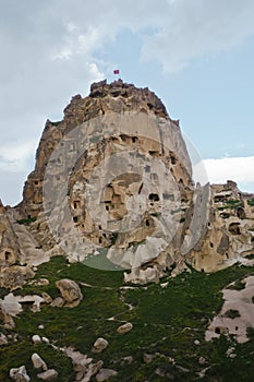Uchisar castle mountain with surrounding landscape and magnificent stone structures near Goreme at Cappadocia, Anatolia