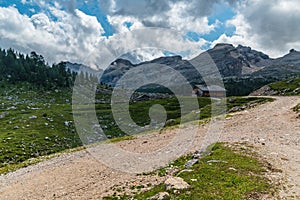 Ucia de Gran Fanes hut with peaks above in the Dolomites photo