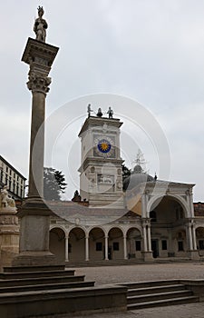 Udine, UD, Italy - December 27, 2023: Clock Tower and statues in the main square