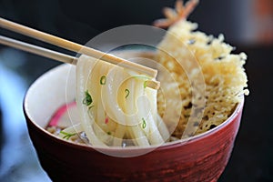 Udon noodle with fried shrimp tempura , Japanese food