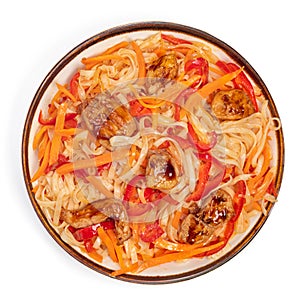 Udon noodles with chicken teriyaki, vegetables and sesame seeds. Asian cuisine. Dish on white background.