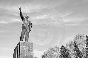 UFA, RUSSIA - 7 APRIL 2019: The monument to comrade Lenin in the town square against the sky. Concept for printing leaflets, cards