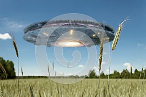 UFO, an alien plate hovering over the field, hovering motionless in the air. Unidentified flying object, alien invasion,