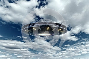 UFO, an alien plate soars in the sky, hovering motionless in the air. Unidentified flying object, alien invasion, extraterrestrial