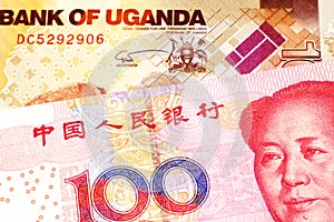 Ugandan currency paired with money from China