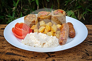 Ugandan Rolex with rice and sausages