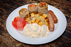 Ugandan Rolex with rice and sausages