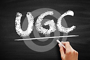 UGC User Generated Content - specific content created by customers and published on social media or other channels, acronym text