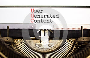 UGC user generated content symbol. Concept words UGC user generated content typed on the old retro typewriter on a beautiful white