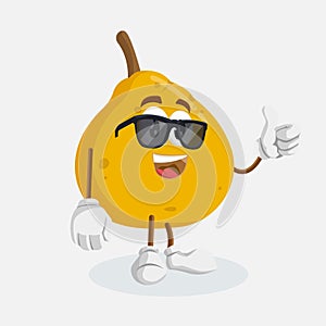 Ugli Fruit mascot and background thumb pose
