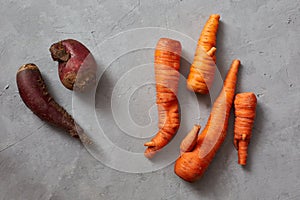 Ugly carrots and beets trending theme of organic products