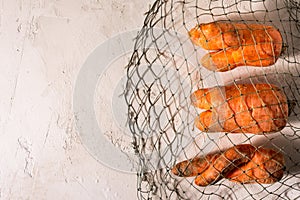 Ugly vegetables, carrots on a light background.funny monster carrot The concept of non-waste production in the food industry