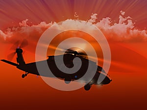 UH-60 Blackhawk flying sunset