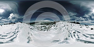 UHD 4K 360 VR of snowy mount top. The sunlight on the peak and ice landscape. Winter frozen rocks